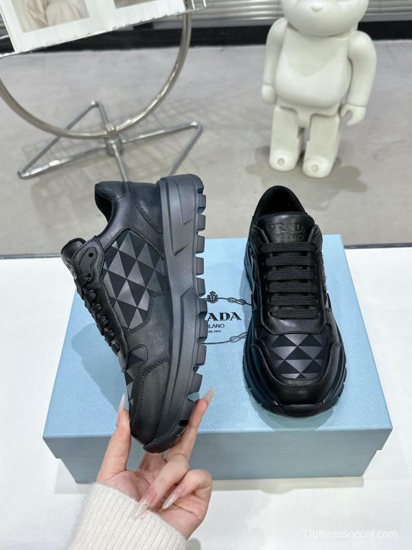 2025 Unisex Prada Black Leather Sneakers KFY00310