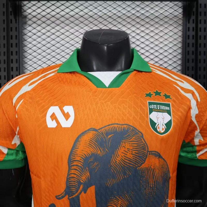 Player Version 2025 Ivory Coast Orange with Elephant Graphic and Green Accents Jersey